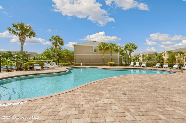 2705 Revolution St Unit 106, Melbourne, FL 32935 - community pool featuring a patio area and fence