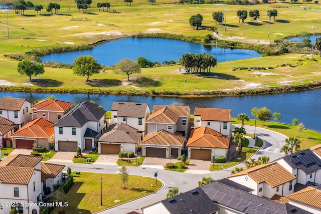 bird's eye view with golf course view, a residential view, and a water view