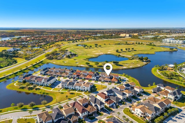 bird's eye view featuring a residential view and a water view