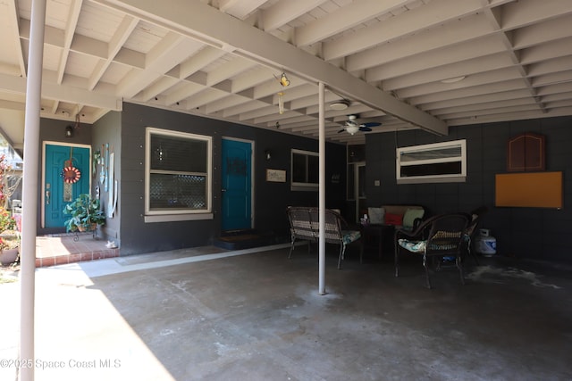 view of patio / terrace featuring an attached carport