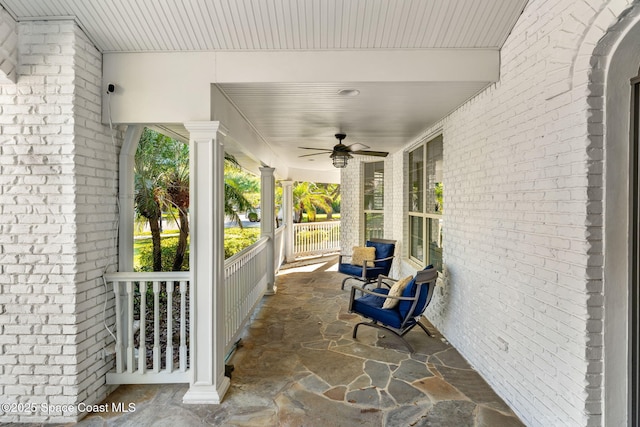 view of patio featuring covered porch and ceiling fan