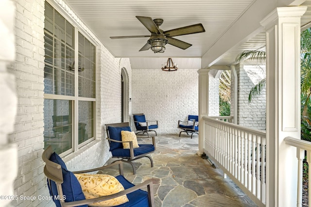 view of patio with a porch and a ceiling fan