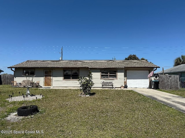 ranch-style house with a front lawn, an attached garage, fence, and driveway