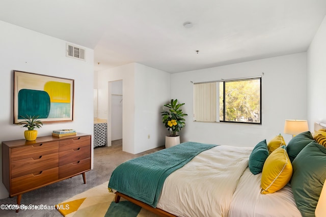 bedroom with visible vents and carpet floors