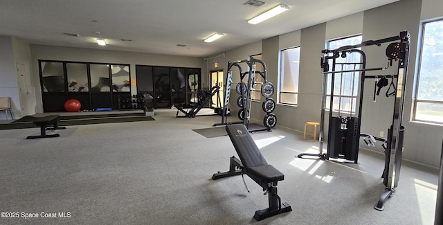 exercise room featuring visible vents