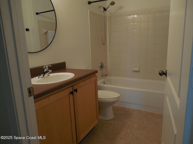 full bathroom featuring tile patterned flooring, toilet, vanity, and  shower combination