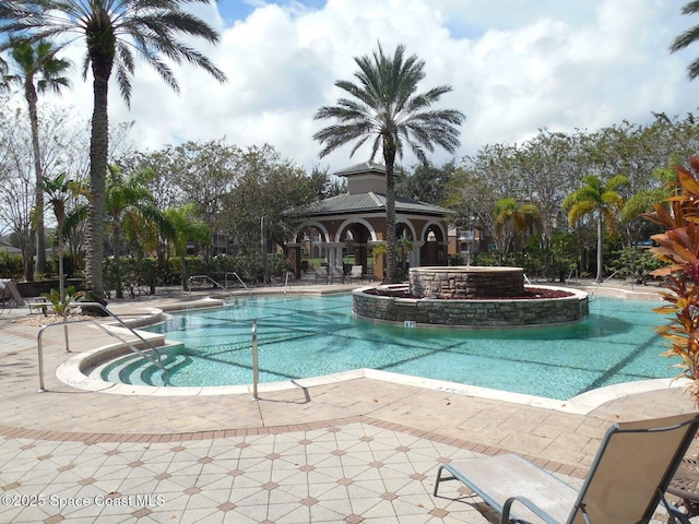 view of swimming pool featuring a gazebo and a patio