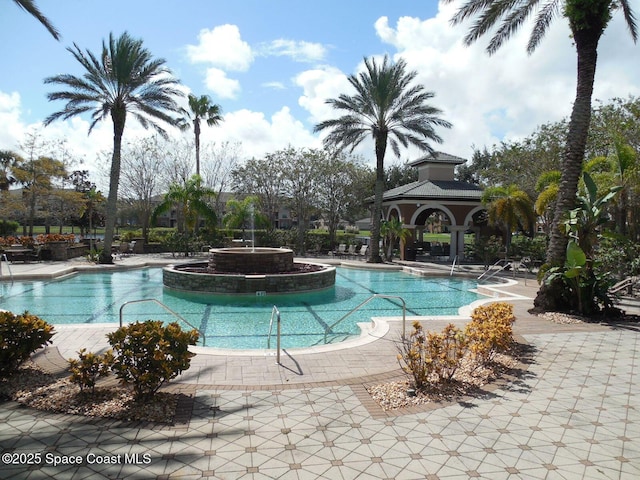 view of swimming pool with a gazebo