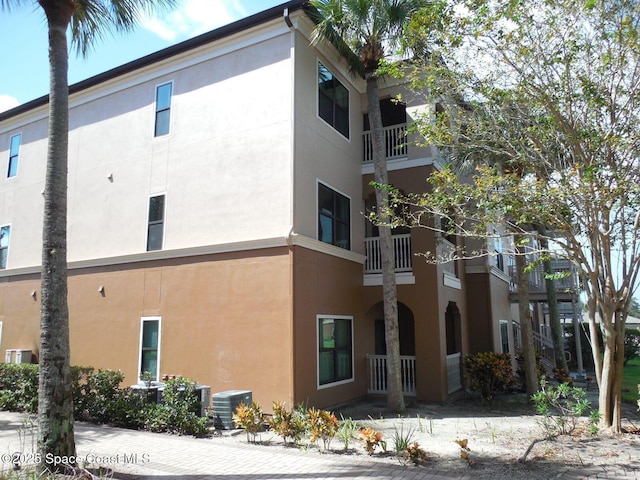 view of property with central AC unit