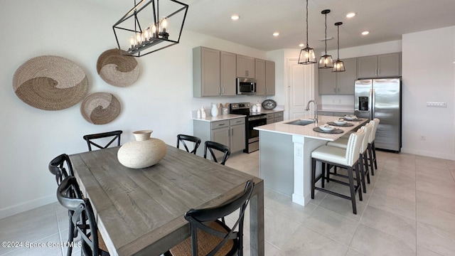 dining space with light tile patterned floors, recessed lighting, and baseboards