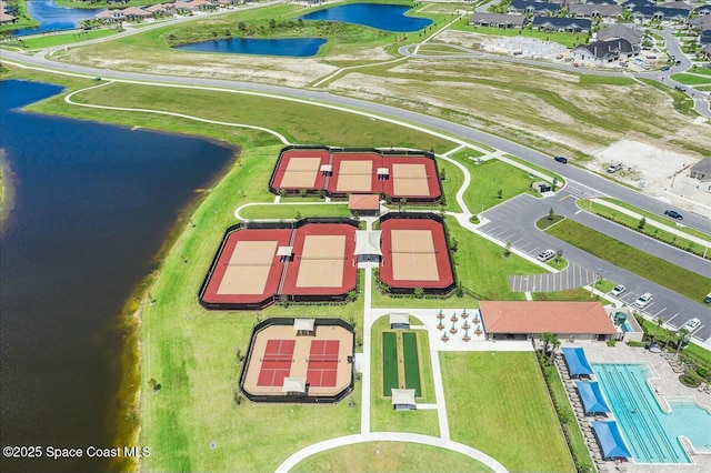 bird's eye view featuring a water view and a residential view