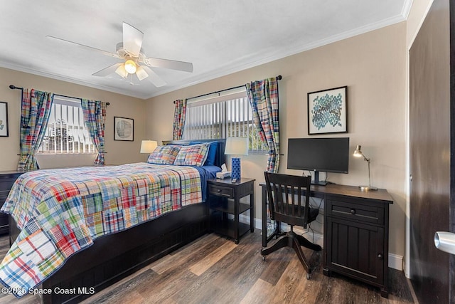 bedroom with multiple windows, crown molding, baseboards, and wood finished floors