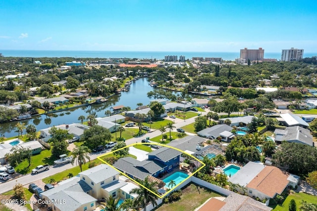 bird's eye view with a water view