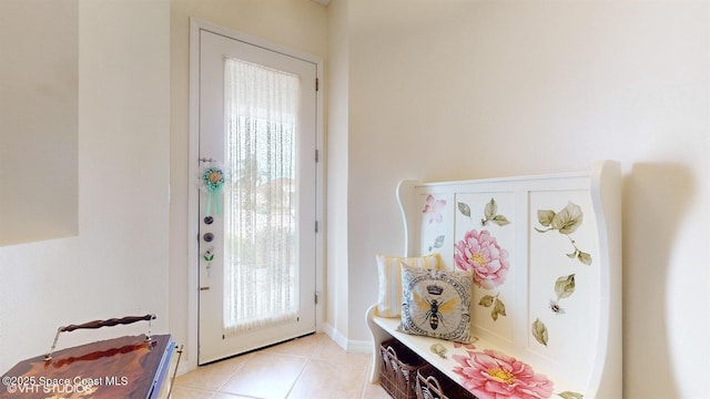 entryway featuring light tile patterned floors