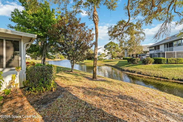 view of yard with a water view