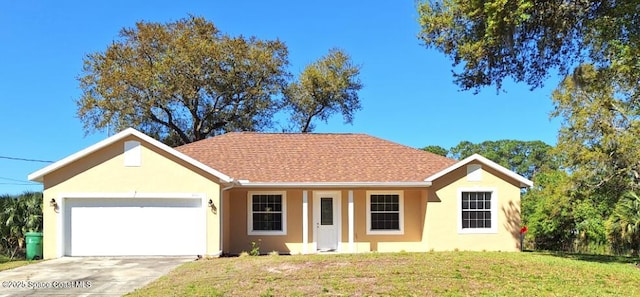 ranch-style home with roof with shingles, driveway, stucco siding, a front lawn, and a garage