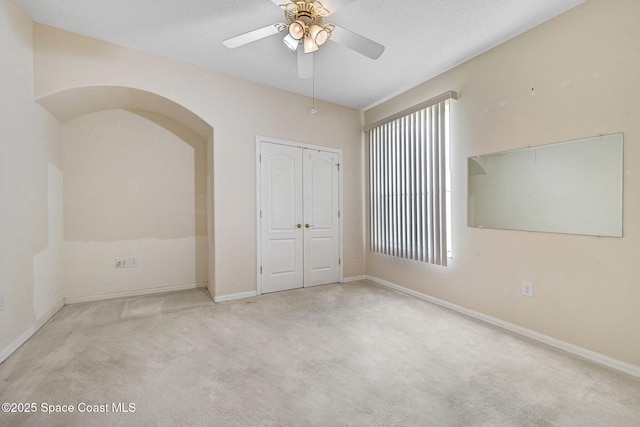 4942 Worthington Cir, Rockledge, FL 32955 - unfurnished bedroom with carpet flooring, a closet, and ceiling fan