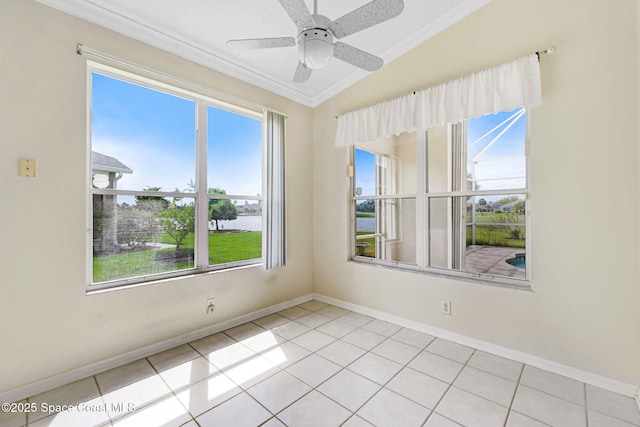 4942 Worthington Cir, Rockledge, FL 32955 - tiled spare room with ornamental molding, healthy amount of natural light, vaulted ceiling, and ceiling fan