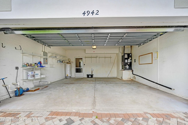 4942 Worthington Cir, Rockledge, FL 32955 - garage featuring gas water heater