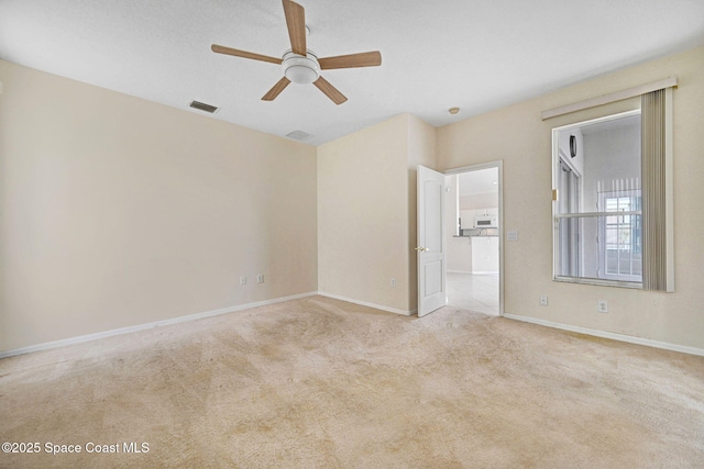 4942 Worthington Cir, Rockledge, FL 32955 - spare room featuring ceiling fan and carpet