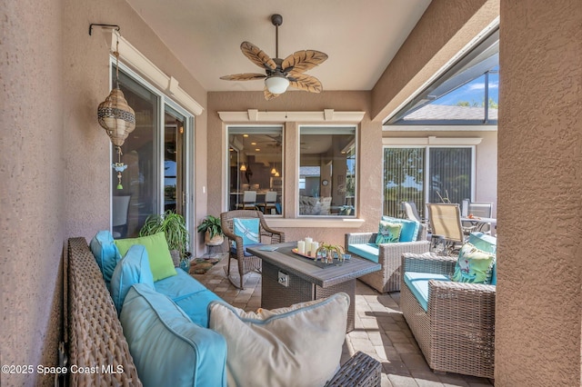 view of patio featuring outdoor lounge area and ceiling fan