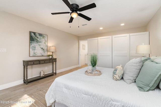 bedroom featuring recessed lighting, light wood-type flooring, baseboards, and visible vents