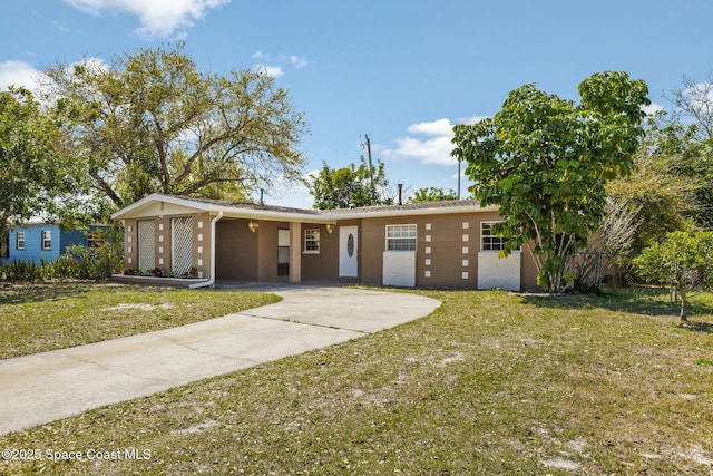 single story home featuring brick siding, a front lawn, and fence