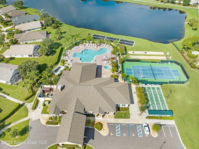 birds eye view of property featuring a water view