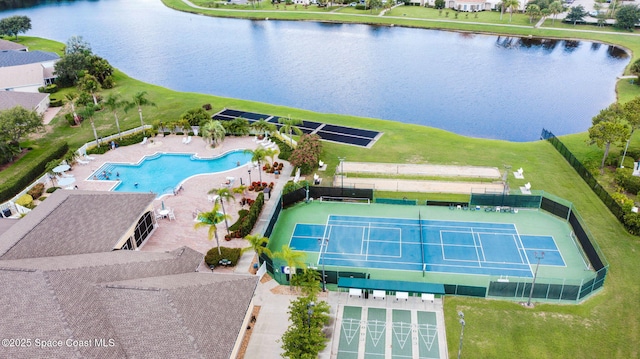 birds eye view of property featuring a water view