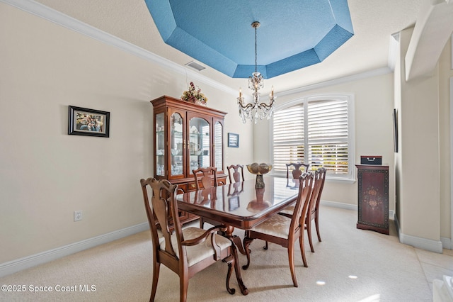 dining room with visible vents, baseboards, a tray ceiling, an inviting chandelier, and a textured ceiling