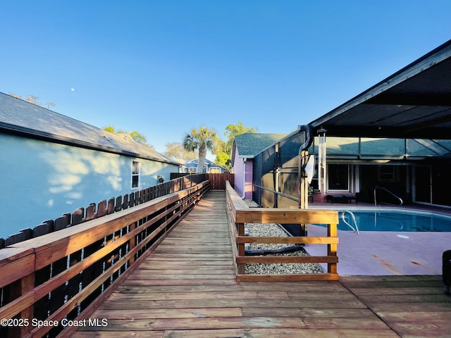 view of dock featuring a patio and fence