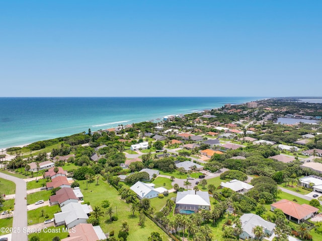 birds eye view of property with a residential view and a water view