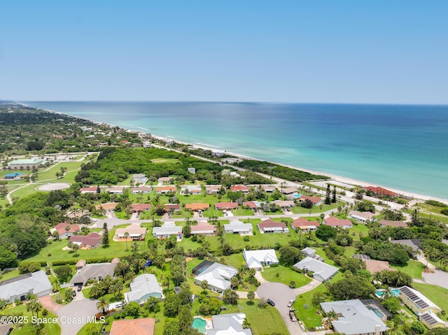 drone / aerial view featuring a residential view and a water view