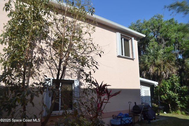 126 Plover Ln Unit 632, Rockledge, FL 32955 - view of home's exterior featuring stucco siding