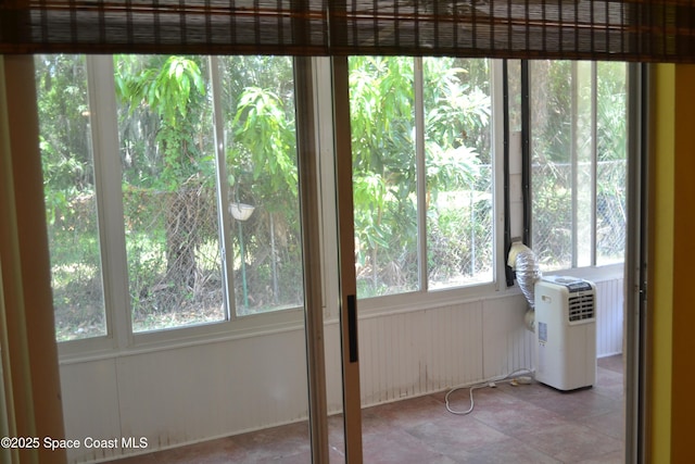 126 Plover Ln Unit 632, Rockledge, FL 32955 - unfurnished sunroom featuring tile patterned flooring