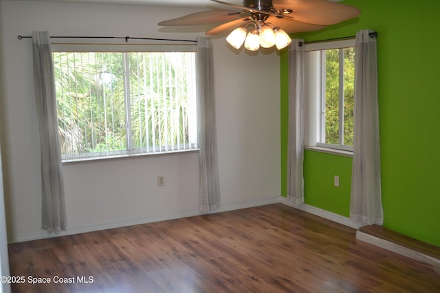 126 Plover Ln Unit 632, Rockledge, FL 32955 - empty room featuring ceiling fan, wood finished floors, and baseboards