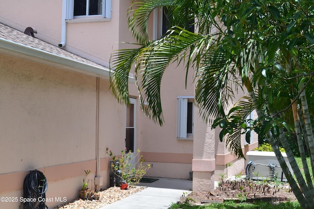 126 Plover Ln Unit 632, Rockledge, FL 32955 - view of side of home with stucco siding