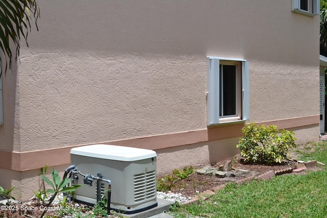 126 Plover Ln Unit 632, Rockledge, FL 32955 - view of side of home with stucco siding