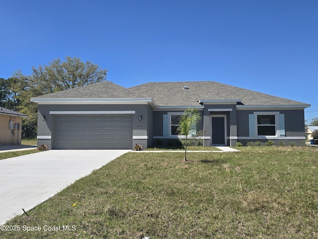 view of front facade with a shingled roof, concrete driveway, a front yard, stucco siding, and an attached garage