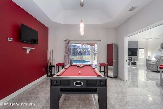 rec room with plenty of natural light, pool table, baseboards, and a tray ceiling