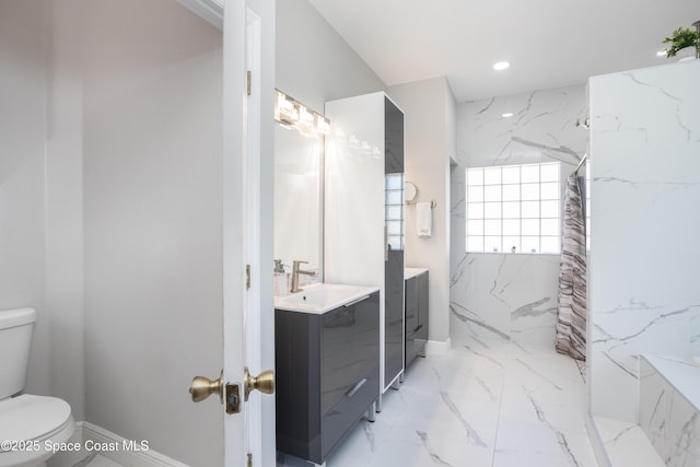 bathroom with vanity, a marble finish shower, recessed lighting, toilet, and marble finish floor