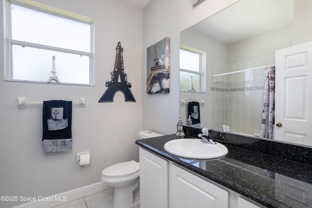 bathroom with toilet, a shower with shower curtain, tile patterned flooring, baseboards, and vanity