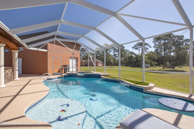 view of swimming pool with a yard, a patio, a lanai, and a pool with connected hot tub