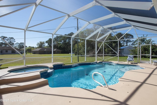 view of pool featuring a patio area, a pool with connected hot tub, a lanai, and a yard