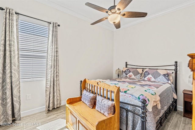 bedroom with wood finish floors, baseboards, ornamental molding, and a ceiling fan