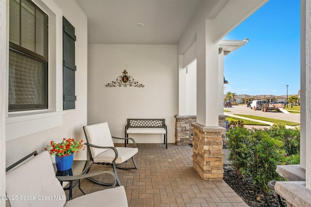 view of patio featuring covered porch