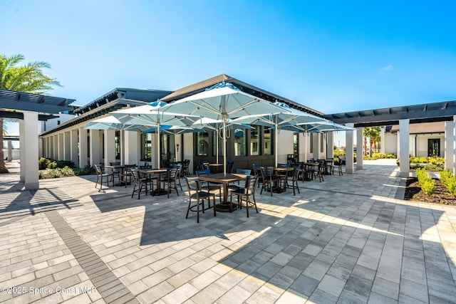 view of patio featuring a pergola