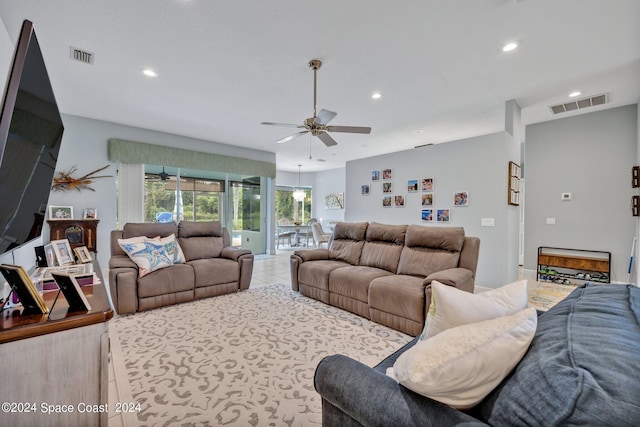 tiled living area with recessed lighting, visible vents, and ceiling fan