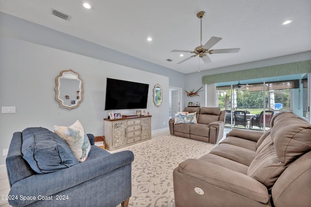 living room with recessed lighting, visible vents, baseboards, and a ceiling fan