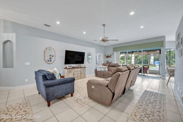 living area featuring a ceiling fan, visible vents, baseboards, light tile patterned flooring, and recessed lighting